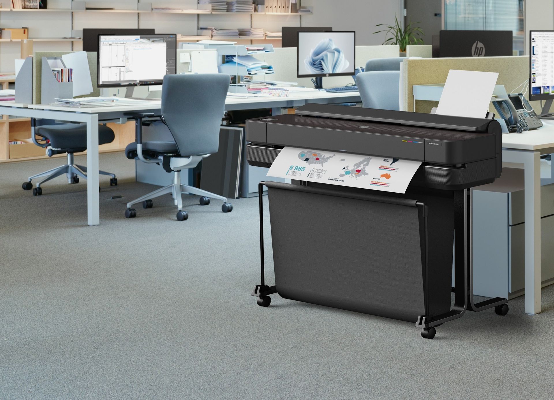 HP DesignJet T650 plotter in an open AEC office. HP product photography.