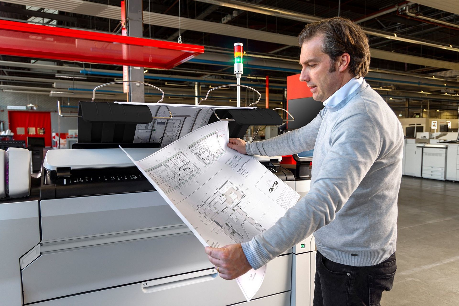 Canon ColorWave large-format printer in a print room
